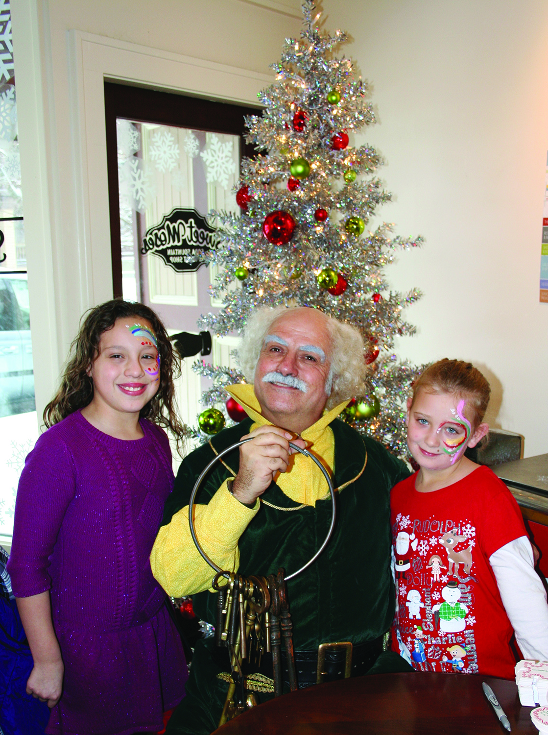 Mr. Jingeling with girls at Gordon Square Holiday Event