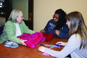 PHOTO BY DEBBIE SADLON Saturday, February 15, 2014; Carnegie West’s Knitting Club, Cleveland Public Library Carnegie West Branch, Fulton & Bridge Avenue: Ohio City resident Fran Palucki mentors new knitters Andrea Marbley and Katie Zucca. 