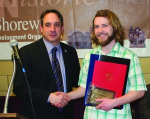 PHOTO BY CHUCK HOVEN Thursday, February 27, 2014, Detroit Shoreway Community Development Organization Annual Meeting, Our Lady of Mt. Carmel Church Hall, W. 69th and Detroit Avenue: (L-R) Ward 15 Councilman Matt Zone congratulates Michael Webster the winner of the Sustainability Award. Webster worked to create a community garden at W. 63rd & Bridge Avenue