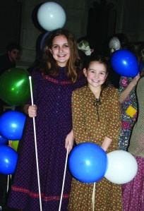 PHOTO BY CHUCK HOVEN Saturday, February 15, 2014; Near West Theatre Benefit, Love Makes the World Go ‘Round, Trinity Cathedral, 2230 Euclid Avenue: Balloons in hand Giovanna Layne and Gabriele Moyer prepare to take the stage. 