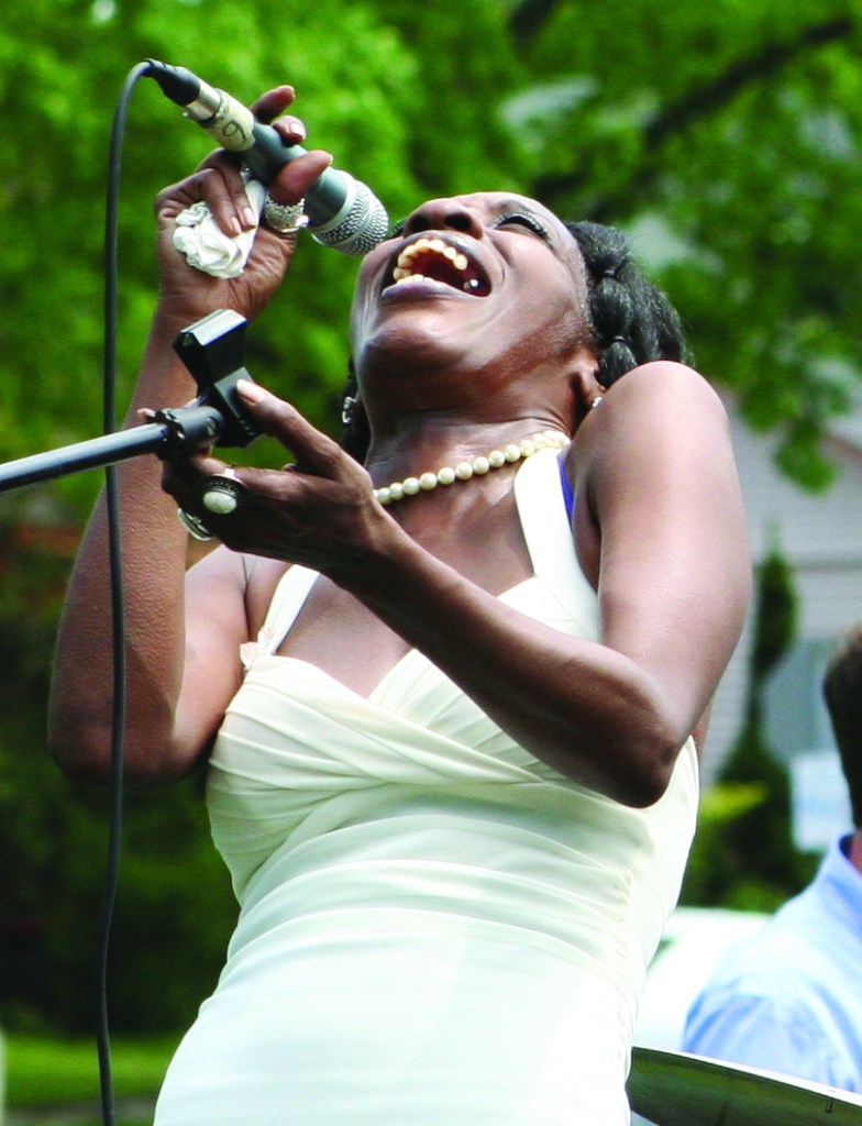 PHOTO BY CHUCK HOVEN Sunday, June 1st, 2014; West Park Summerfest, Jefferson Park, Lorain Avenue between W. 133 & W. 134th Streets: Ree-C Pearl, belts out the blues, on stage with The Vernon Jones Blues Cartel.