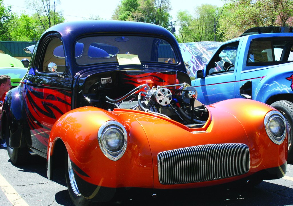 PHOTO BY CHUCK HOVEN Saturday, May 24th, 2014; Car Show, Max Hayes Career and Technical High School, 4600 Detroit Avenue: This 1941 Willys Coupe is a colorful addition to the 2014 Max Hayes Car Show.  