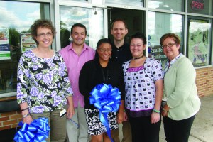 PHOTO BY JOHN CARTWRIGHT Thursday, August 14, 2014; Ribbon Cutting and Community Celebration of the opening of the Puritas Office of Neighborhood Family Practice, 14037 Puritas Avenue (in Puritas Park Plaza): The staff of the Puritas Office of Neighborhood Family Practice featured above are: James Diekroger, MD; Brandi Dobbs, CNP; Constance Barath, RN; John Jason, Patient Advocate & Office Manager, Faith Walsh, Medical Assistant; and Maryann Kuzila, LPCC Counselor. Not shown:  Celeste Curtis, Medical Office Specialist, and Karen Acosta, Medical Assistant. 