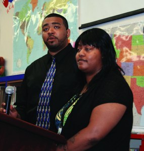 PHOTO BY DEBBIE SADLON Friday, August 22, 2014; First day of preschool, Tremont Montessori Elementary School, 2409 W. 10th Street: Parents Pierre Sain and Javin Polk testify to the quality of the preschool program at Tremont Montessori and the positive impact it has had on their three children Kalissa (now in third grad), Pierre now in 1st grade, and JáVierre in his second year of preschool. 