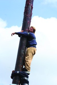 PHOTO BY CHUCK HOVEN Monday, September 1, 2014; St. Rocco Festival: On the 100th year of the festival, ten teams entered the greasy pole-climbing contest. Each team had three chances to make it to the top, none of the teams were successful. At the conclusion of the contest, it was announced that the $1,000 prize donated by sponsors of the contest will double next year. 