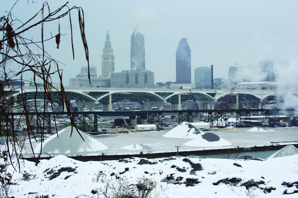 PHOTO BY CHUCK HOVEN Wednesday, November 19, 2014; University Road at W. 10th, Tremont neighborhood: A view of the Industrial Flats and Downtown Cleveland from University Road on the proposed path for one of the new sections of the Towpath Trail. This section of the trail from Literary Avenue to a new Canal Basin Park is expected to be completed in the Fall of 2018. 