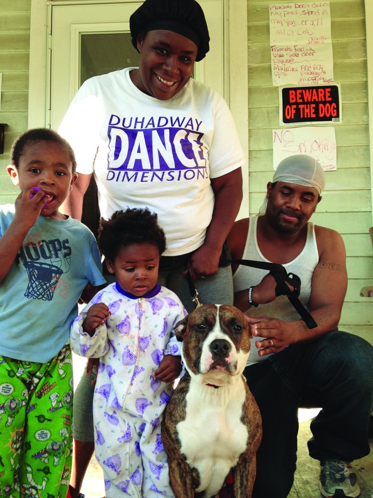 PHOTO BY BECCA BRITTON Trowbridge Avenue: The Jackson Family and their dog Stormy took advantage of the free pet care services offered by Project CARE for income eligible residents of the Clark Fulton and Brooklyn Centre neighborhoods. Free services include vaccinations, collar/leash, ID tags, spay-neuter and more. These services include free spay/neuter for stray cats. Project CARE is a program of the Cleveland Animal Protective League that is fully funded by American Society for the Prevention of Cruelty to Animals (ASPCA). To see if you are eligible for services for your pet call Becca Britton at 216-255-5012 or email bbritton@clevelandapl.org. 