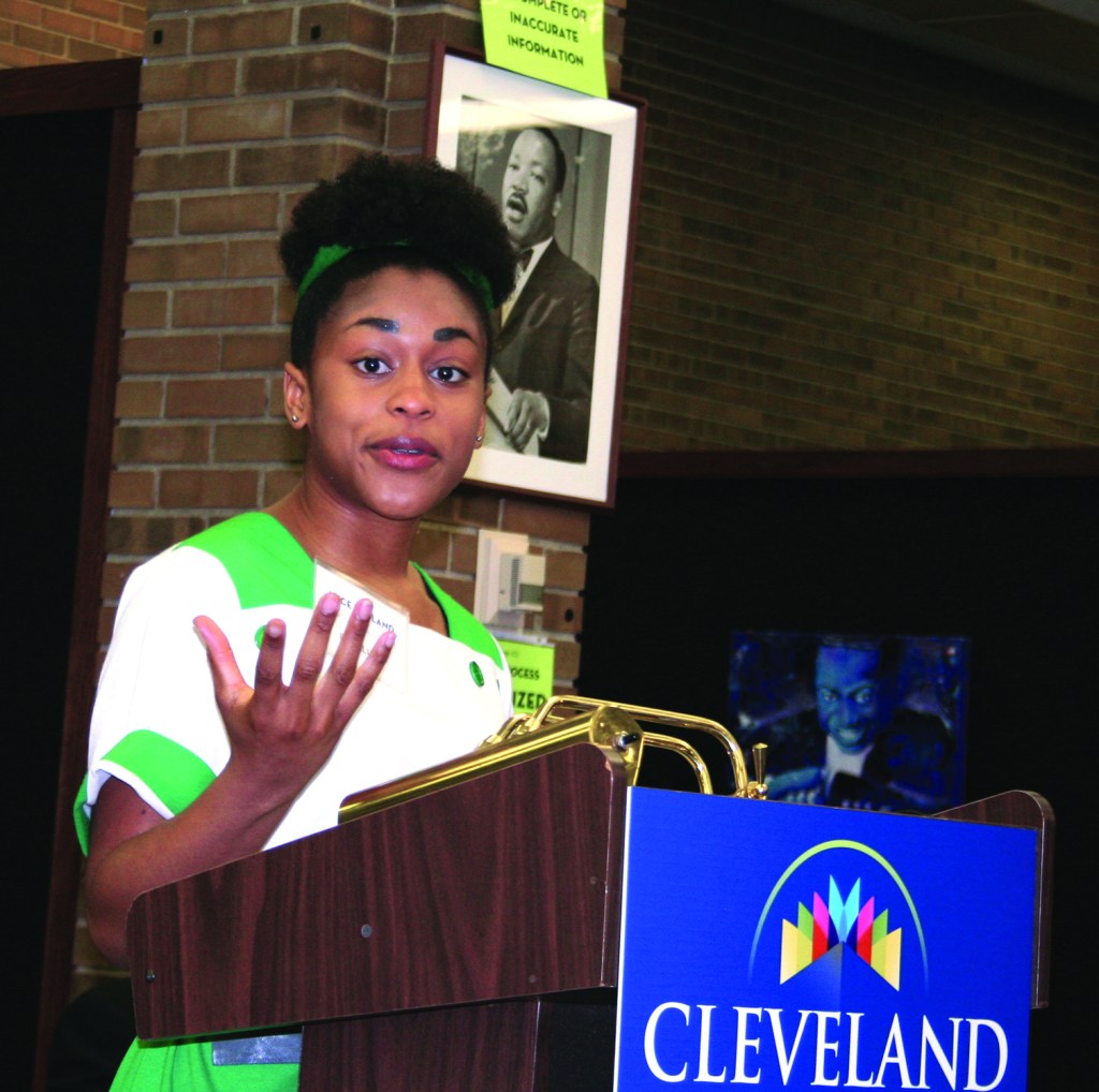 PHOTO BY CHUCK HOVEN Saturday, April 18, 2015; Community Forum on Police Accountability, Surveillance and Civil Rights presented by Greater Cleveland Civil and Human Rights Coalition and community partners, Martin Luther King Jr. Library, 1962 Stokes Blvd: Alice Ragland, an organizer with the Ohio Student Association and a member of the panel on Body-Worn Police Cameras, speaks about how messages from society create an implicit bias that causes people to see African Americans as threatening. 