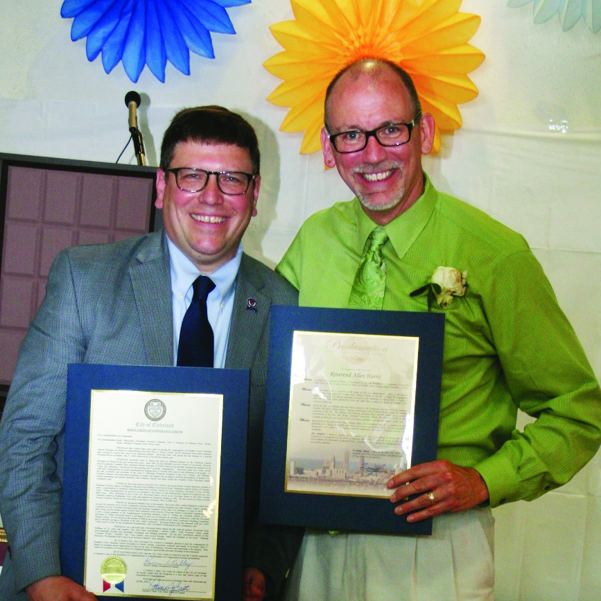 PHOTO BY DEBBIE SADLON Sunday, May 17, 2015; Reception and Luncheon for Pastor Allen V. Harris, Franklin Circle Church, 1688 Fulton Road: Ward 3 Councilman Joe Cimperman presents Rev. Allen Harris with a proclamation from the City of Cleveland honoring his 14 years of service to the community.
