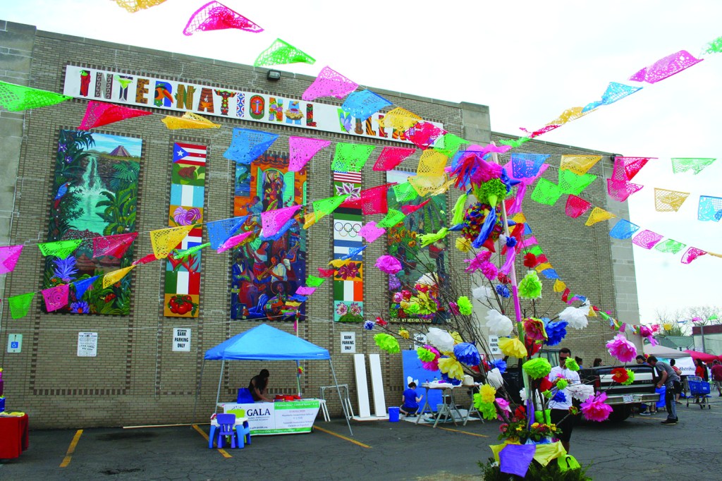 PHOTO BY DEBBIE SADLON Saturday, May 9, 2015; La Placita, monthly neighborhood open air market, US Bank Building Parking Lot, W. 25th and Clark Avenue: A brightly decorated La Placita awaits visitors on its first monthly market day.