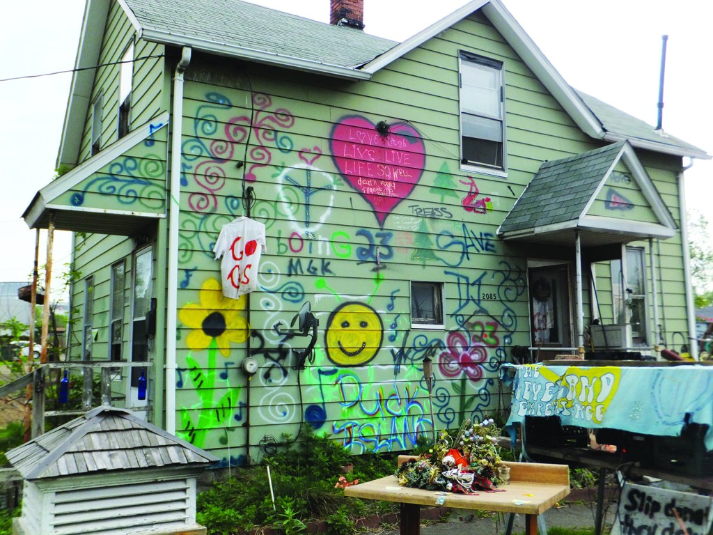 PHOTO BY BERNADETTE JOGAN May 2015, Duck Island Neighborhood, W. 19th and Abbey Avenue: Neighbors point out a house with an unusual sense of décor. 