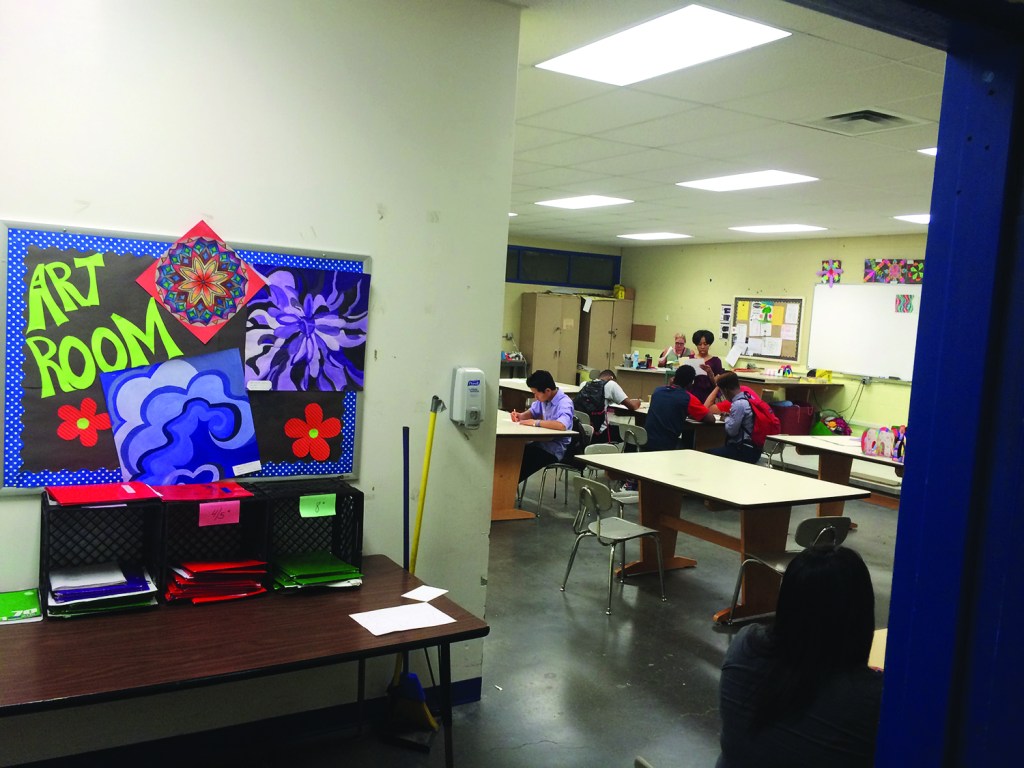 An art teacher was forced to move into a windowless, basement classroom after her room was damaged by water leaks.