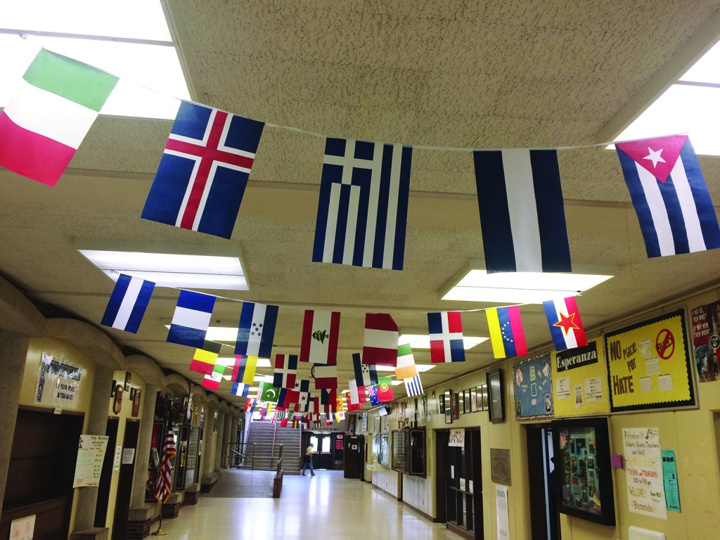 L-W's main hallway celebrates school diversity with flags from around the world.