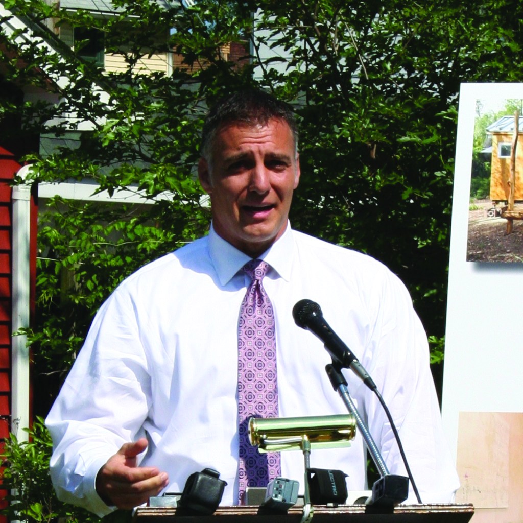 PHOTO BY DEBBIE SADLON Thursday, May 28, 2015; W. 58th Street and Pear Avenue: Joe DiRocco, President of Citizens Bank, Ohio talks about a donation of $140,000 by Citizens Bank toward the cost of building the first tiny house in Cleveland. 