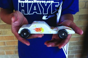 PHOTO BY DEBBIE SADLON Friday, June, 26, 2015; Max Hayes Career and Technical High School Summer Camp, 4600 Detroit Avenue: Judges determined that the Phoenix Flame, designed and built by Angel Padilla, was the best designed car in the summer camp competition. Each student, participating in the camp, designed and built their cars.