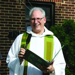 PHOTO BY CHUCK HOVEN Saturday, July 18, 2015; Prayer Garden Groundbreaking and Blessing, St. Wendelin Parish, 2281 Columbus Road: St. Wendelin Pastor Rev. Robert J. Kropac says the new prayer garden, in front of the entrance to the rectory, is part of an effort to make the parish buildings more accessible for the parish as well as neighborhood groups like the Duck Island Block Club. 