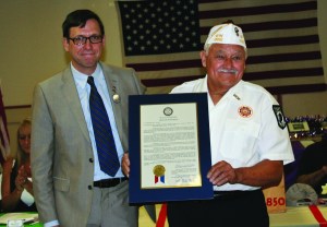 PHOTO BY CHUCK HOVEN Saturday, July 18, 2015; Vietnam War Commemorative Partner Ceremony, VFW 2850 Meeting Hall, 3296 W. 61st Street: VFW Post 2850 Commander Ray Diaz accepts a copy of a City Council Resolution from Ward 14 Councilman Brian Cummins. The ceremony honored those that served in Vietnam -- the living and the fallen -- fifty years after the beginning of the United State’s involvement in the conflict. 