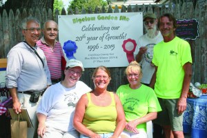 PHOTO BY DEBBIE SADLON Saturday, August 8, 2015; 20th Anniversary Celebration, Bigelow Garden Site, 3164 W. 82nd Street: Bigelow gardeners: (L-R) Front Row: Garden Leader Jan Lascko, Linda Gilbert, and Patti Vandepol. (L-R) Back Row: Chuck Hoven, Ahmed Morad, Tom Mullen, and Brian Gilbert. (Not shown: Doug Hoven) 