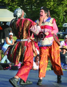 PHOTO BY DEBBIE SADLON Tuesday, August 4th, 2015; Cleveland Public Theatre’s Student Theatre Enrichment Program performance of an original new play, Lost in the Water, Herman Park, W. 58th and Herman Avenue: in the Act, Storm of the Gods, inspired by the Susanoo-no-Mikoto story of Japan, Amatarasu, Goddess of Sun and Fire (portrayed by Omarri Vargas) confronts Susanoo, God of Storms and Seas (portrayed by Amaan Dixon) concerning his bad behavior. 