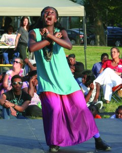 PHOTO BY DEBBIE SADLON Tuesday, August 4th, 2015; Cleveland Public Theatre’s Student Theatre Enrichment Program performance of an original new play, Lost in the Water, Herman Park, W. 58th and Herman Avenue: In the act entitled To the River, inspired by Selekana and the River Goddess, A South African Myth, Selekana (portrayed by Tasheania Lee) sings a song to Dezbezisa, the River Goddess, asking for her blessing. 