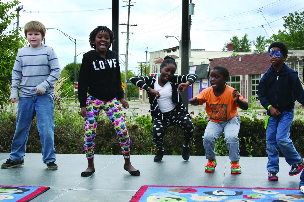 PHOTO BY DEBBIE SADLON Saturday, September 12, 2015; the Bridge Beats and Treats Festival, West Side Community House, 9300 Lorain Avenue: A group of children demonstrate their dance skills on stage. 