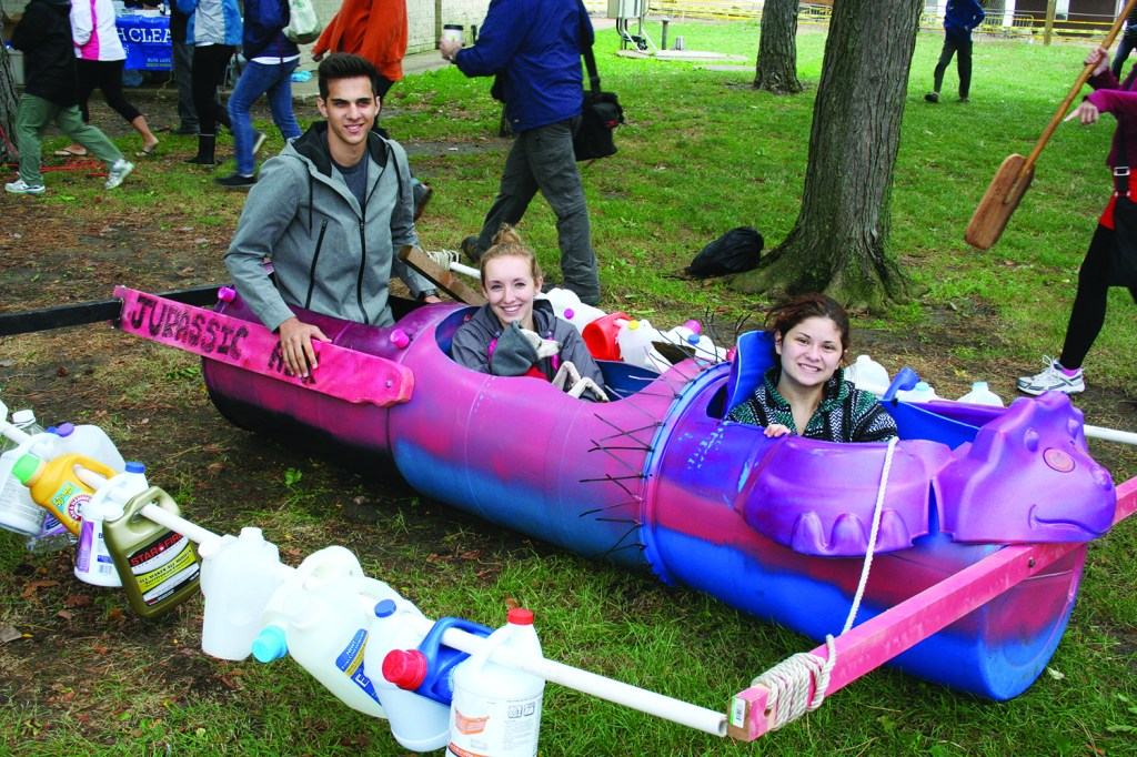 PHOTO BY DEBBIE SADLON Saturday, September 12, 2015; Great Lake Erie Boat Float, Edgewater Park: Jurastic Ark II won the award for the “Most Artistic” boat. Judges liked the “creative” and “colorful” design. Venture Crew 575 members Adam Corrao, age 18 of Independence, Ohio; Madeline Connelly, age 16 of Hudson, Ohio; and Hope Austin, age 16, of Nordonia, Ohio created the craft. 