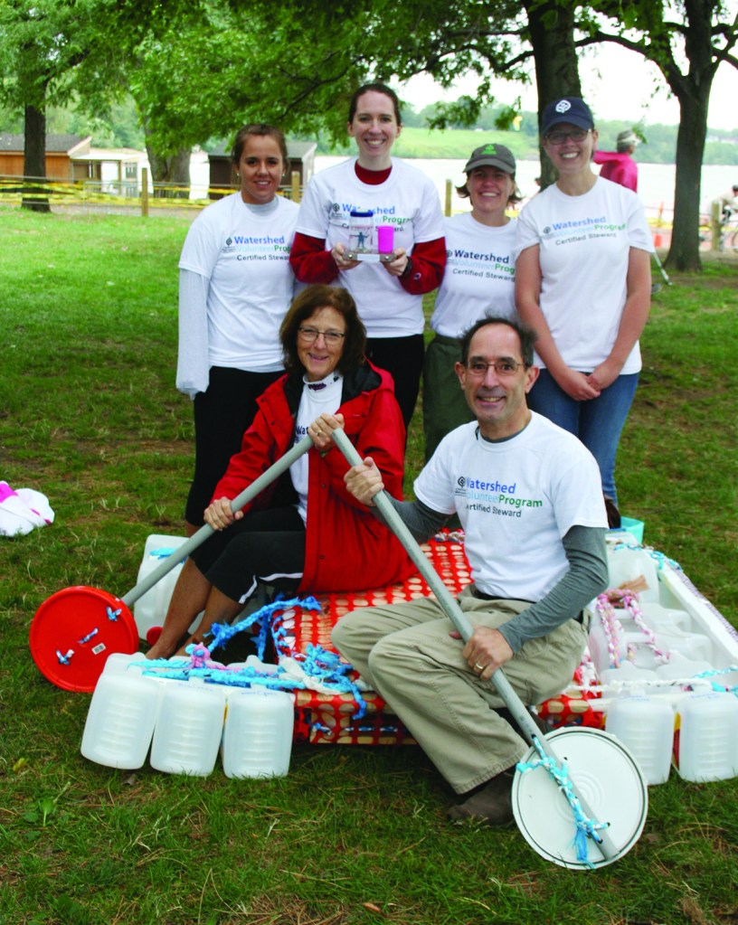 PHOTO BY DEBBIE SADLON Saturday, September 12, 2015; Great Lake Erie Boat Float, Edgewater Park: The award for best use of recycled and repurposed materials went to the builders of A Watershed Moment. The team used plastic kitty litter bottles held together with braded plastic bag rope to help float a pallet. Their oars were made from the lids of large plastic tubs. Team members are: (Front row): Carrie Hansen and David Saja. (Rear): Erin Tesny, Maggie Kane, Leila Jackson and Megan Smith. Not shown: Ellen Brown-Armstrong. 