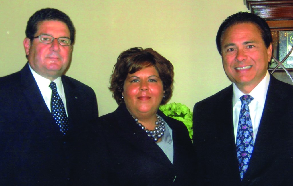 PHOTO COURTESY OF CANNON LO PRESTI & CATAVOLOS FUNERAL HOME Wednesday, October 7, 2015; Grand Opening of the newly remodeled Cannon Lo Presti & Catavolos Funeral Home, 11210 Detroit Avenue: Friends and partners (L-R) George P. Catavolos, Lindsey Cannon and Don Lo Presti celebrate at the grand opening ceremony for their funeral home. 