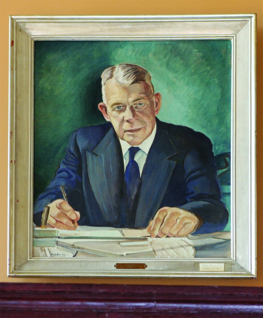 PHOTO BY DEBBIE SADLON Thursday, October 15, 2015; West Tech Alumni Association Museum, Auditorium Balcony, 2201 W. 93rd: The portrait of legendary West Tech Principal Charles Cecil Tuck looks down on the museum from the balcony. Tuck, who arrived at West Tech in 1924, served as the high school’s principal for 34 ½ years.