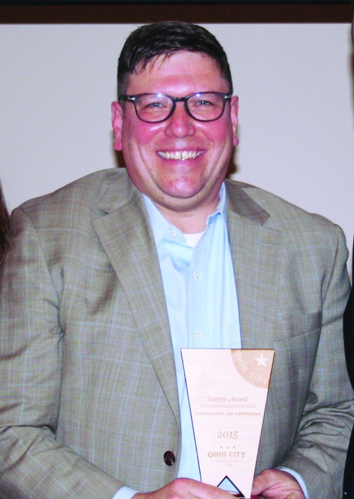 PHOTO BY CHUCK HOVEN Tuesday, March 22, 2016, Ohio City Incorporated (OCI) Annual Meeting, Urban Community School, 4909 Lorain Avenue: Ward 3 Councilman Joe Cimperman was honored by OCI with a Legacy Award for his service of nearly 19 years of as a Cleveland City Council Representative. 